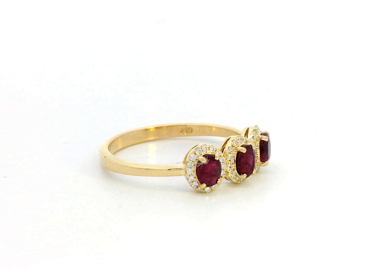 18K Gold Ruby Trilogy Ring with Diamond Halo – 0.78 Carat Ruby & 0.11 Carat Diamonds – July Birthstone