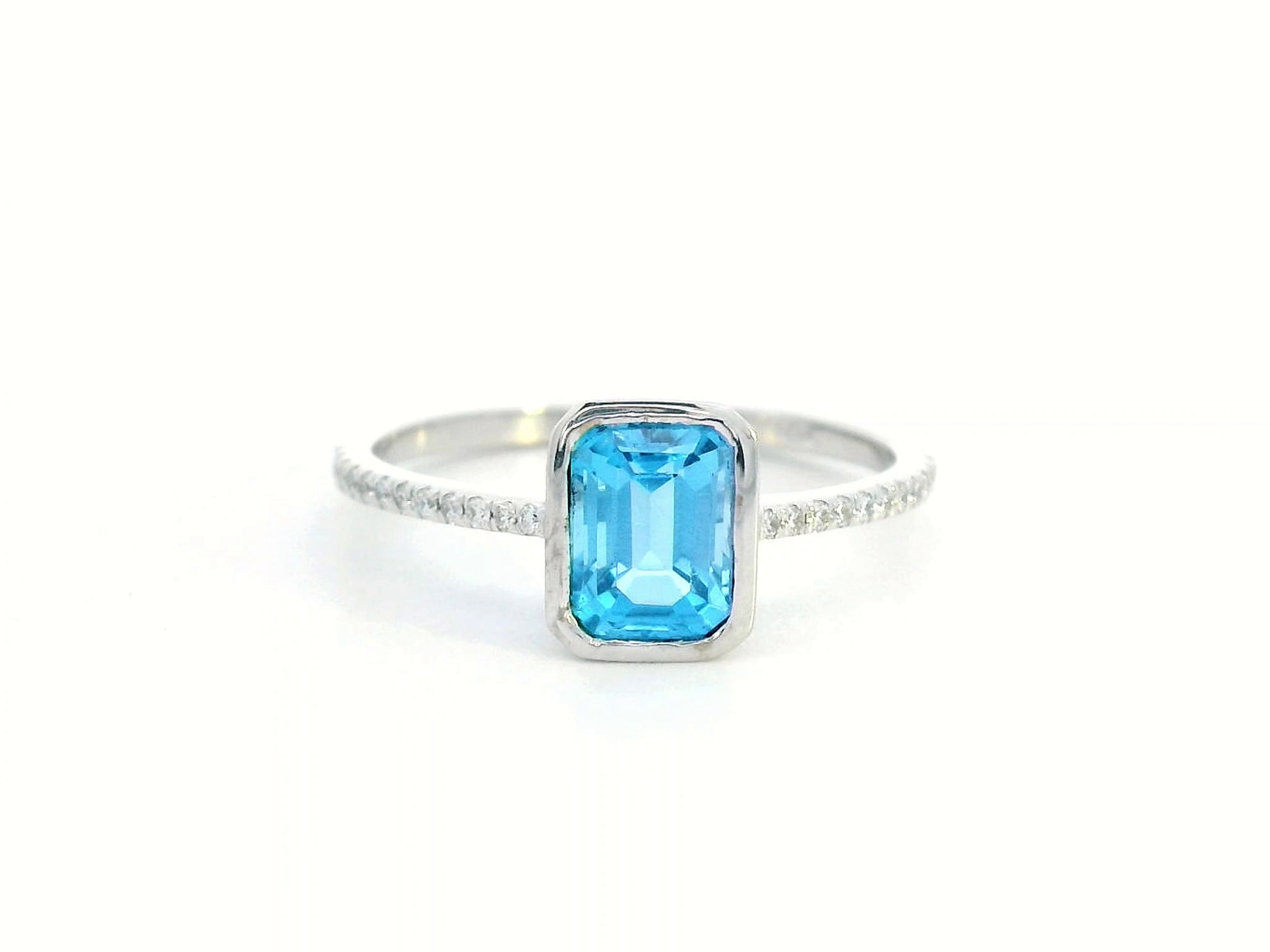Elegant 18K Gold Blue Topaz and Diamond Ring – 1.34ct Emerald-Cut Gemstone, 0.11ct Diamonds – Bezel Set, Luxury Fine Jewelry for Women
