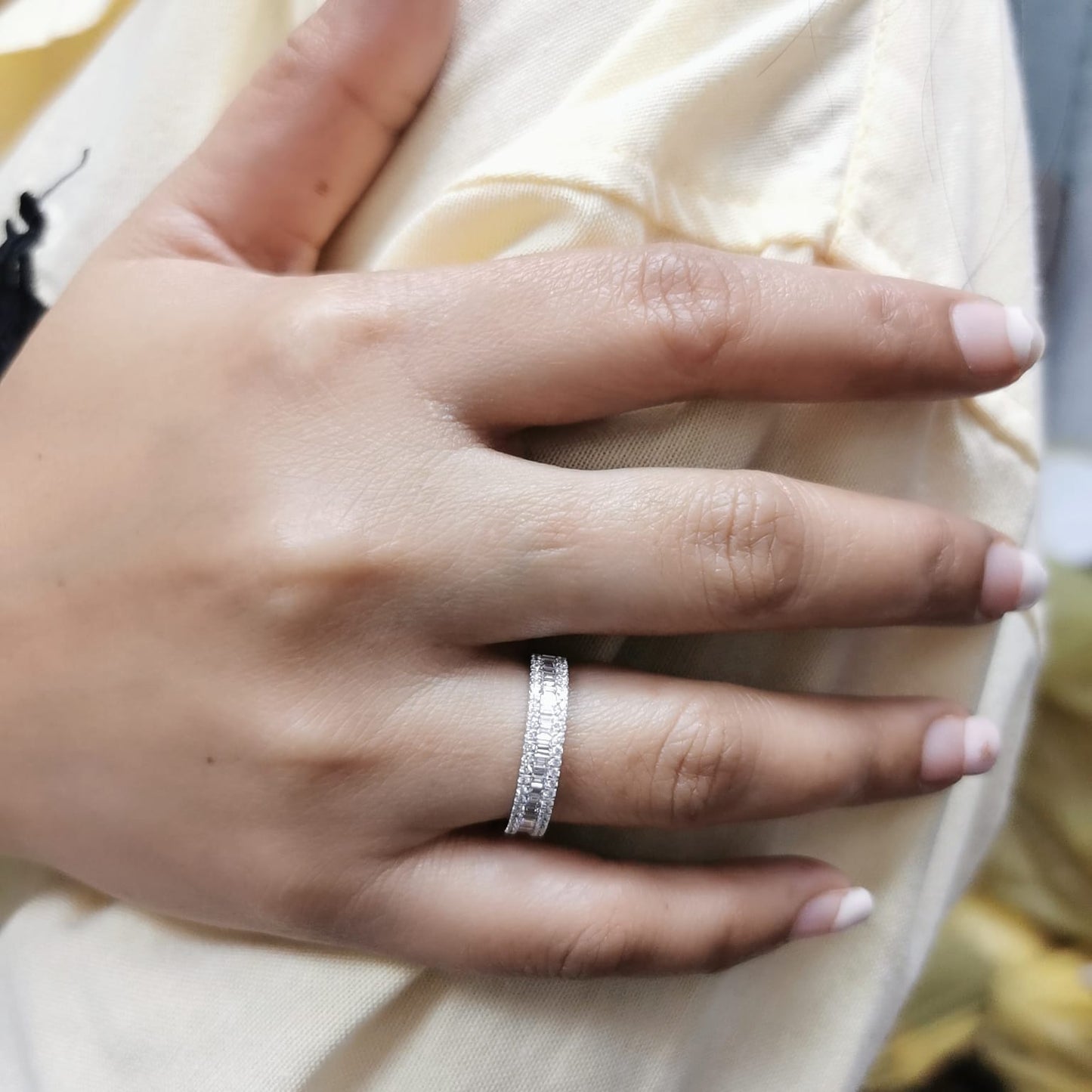 18K gold diamond band featuring 0.67 carats of round and baguette-cut diamonds – perfect as a wedding band, stackable ring, or statement jewelry.