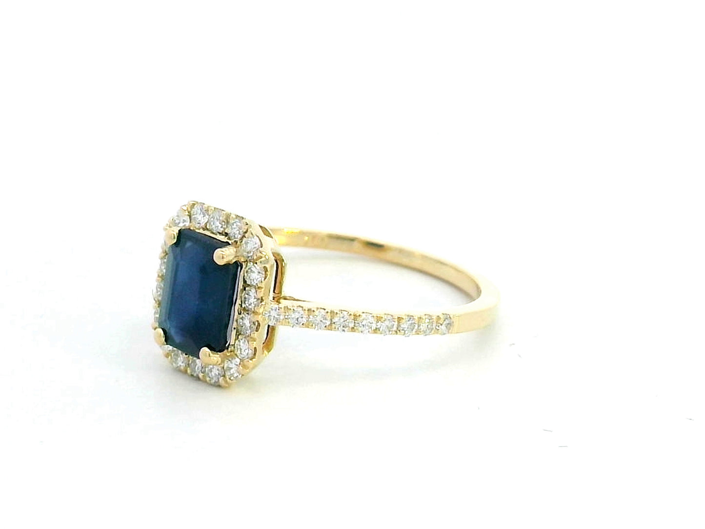 Emerald cut blue sapphire ring with diamond halo in 18K yellow gold – 1.43 CT sapphire, 0.34 CT diamonds