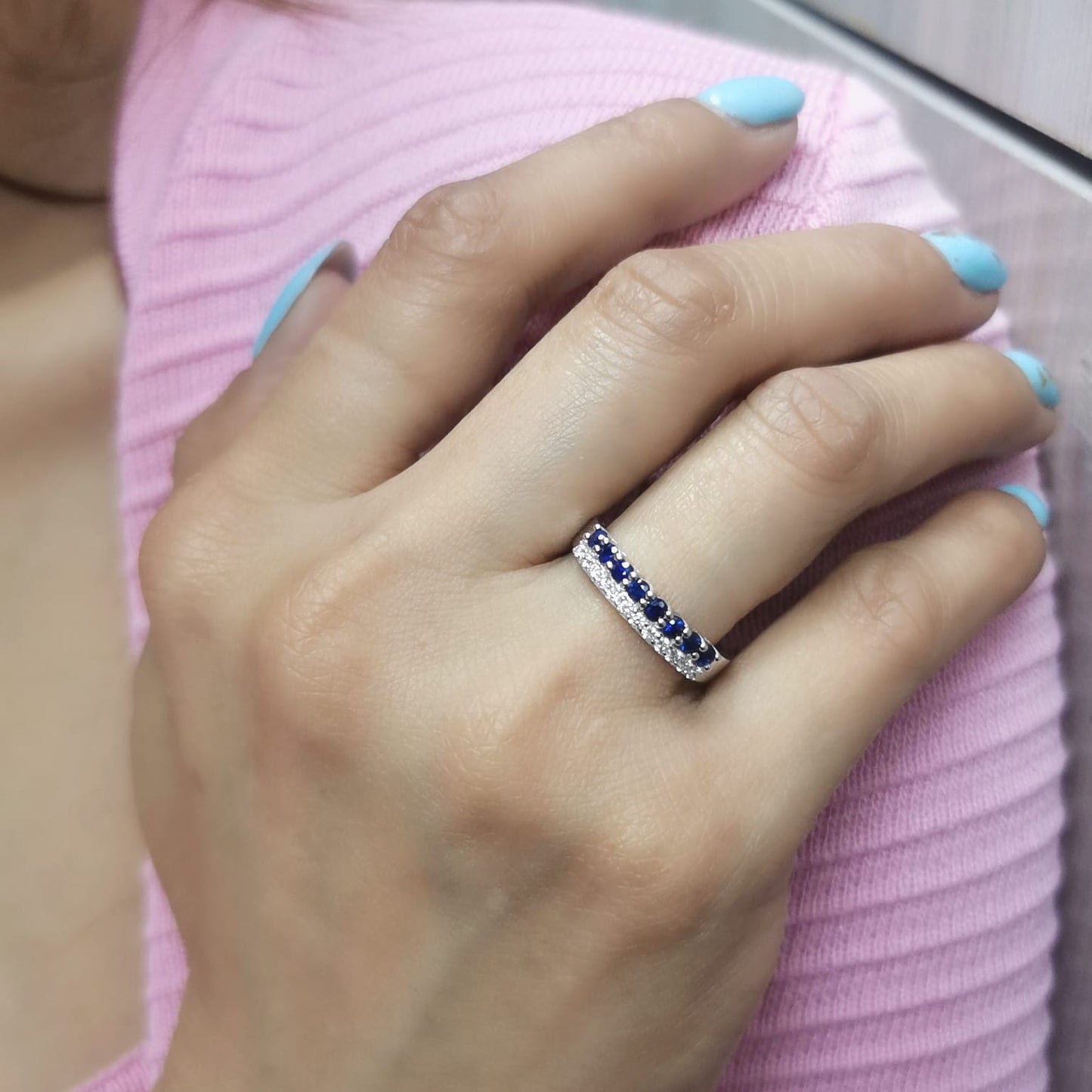 Elegant 18K gold sapphire and diamond ring featuring 0.54 carats of deep blue sapphires and 0.19 carats of brilliant diamonds. A timeless stacking band for weddings, anniversaries, and daily elegance.