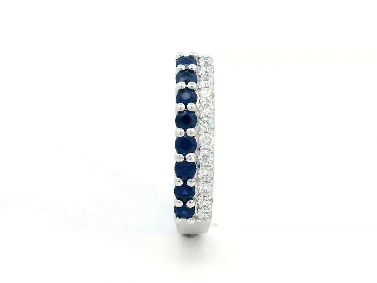 Elegant 18K gold sapphire and diamond ring featuring 0.54 carats of deep blue sapphires and 0.19 carats of brilliant diamonds. A timeless stacking band for weddings, anniversaries, and daily elegance.