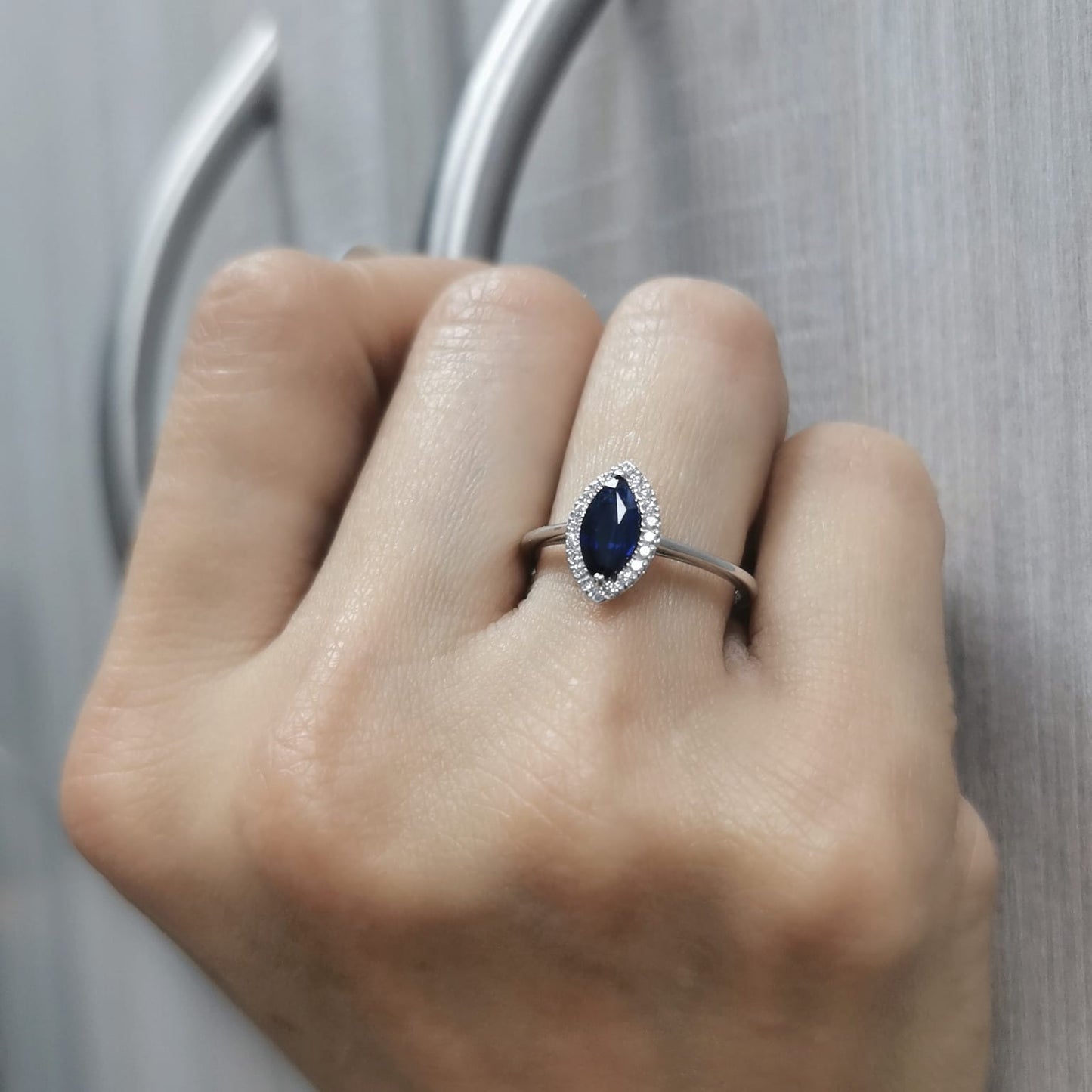 Marquise Blue Sapphire and Diamond Halo Ring in 18K Gold – 0.84 CT Sapphire, 0.15 CT Diamonds