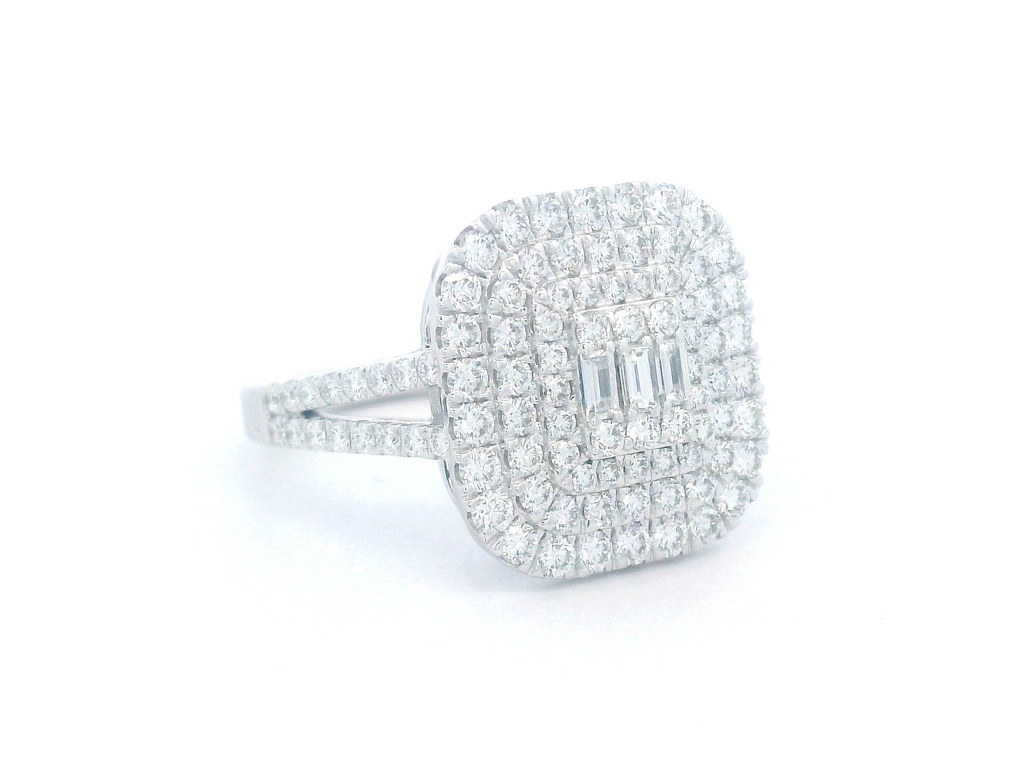 18K gold cushion-shaped diamond cluster ring with split diamond band.