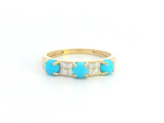 18K gold turquoise and diamond ring with an alternating pattern of three turquoise stones and sparkling diamonds.