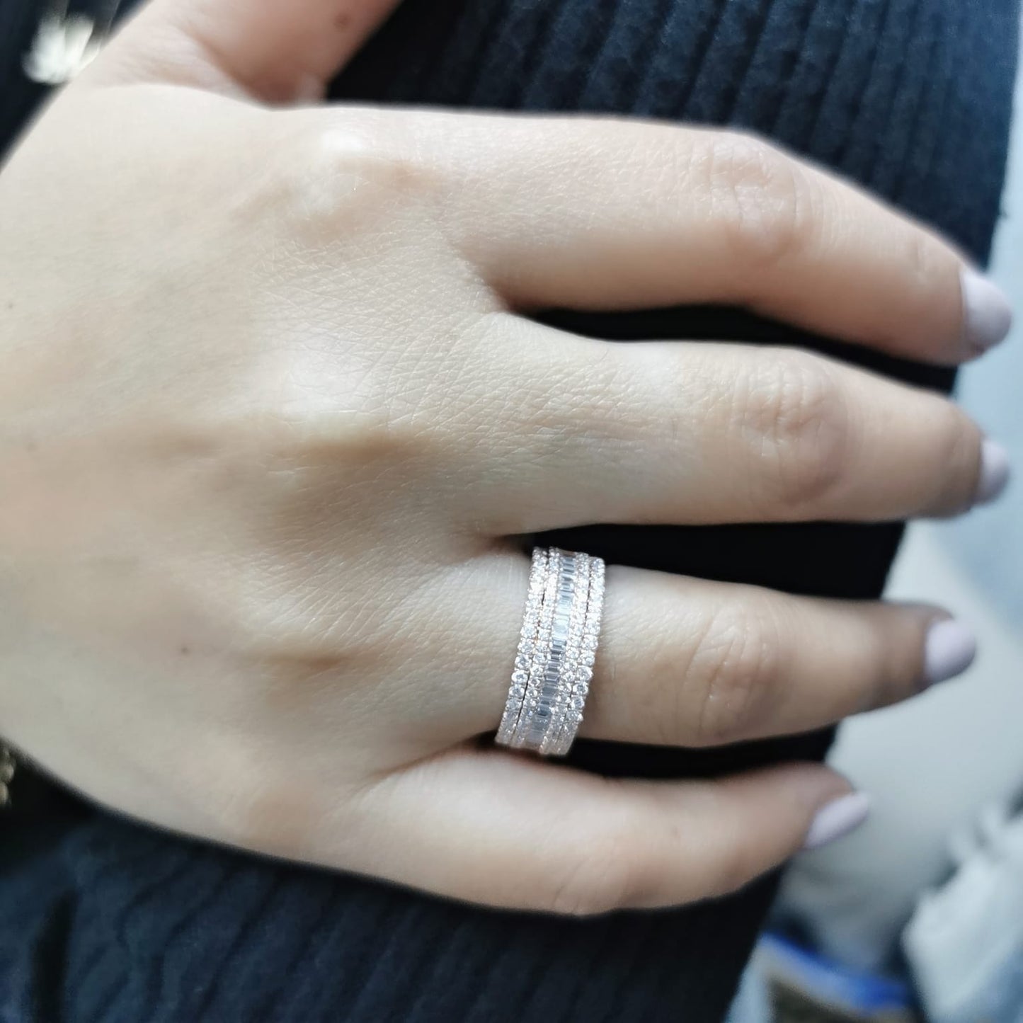 18K rose gold multi-row diamond band with round and baguette diamonds.