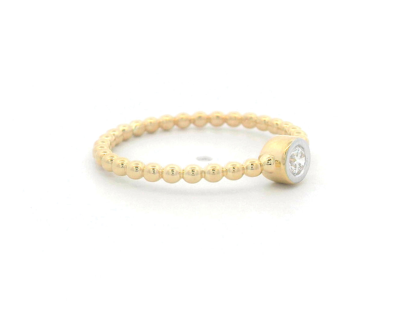 Minimalist 18K gold beaded band ring with a bezel-set 0.08ct diamond, perfect for stacking or everyday wear.