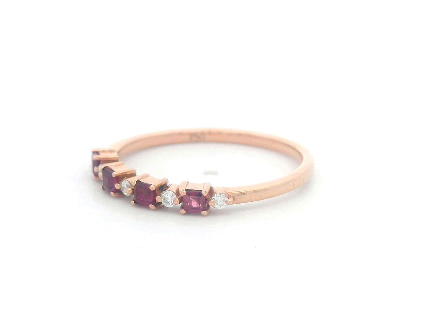 18K rose gold ring with alternating square-cut rubies and diamonds – Perfect for stacking or as a birthstone ring.