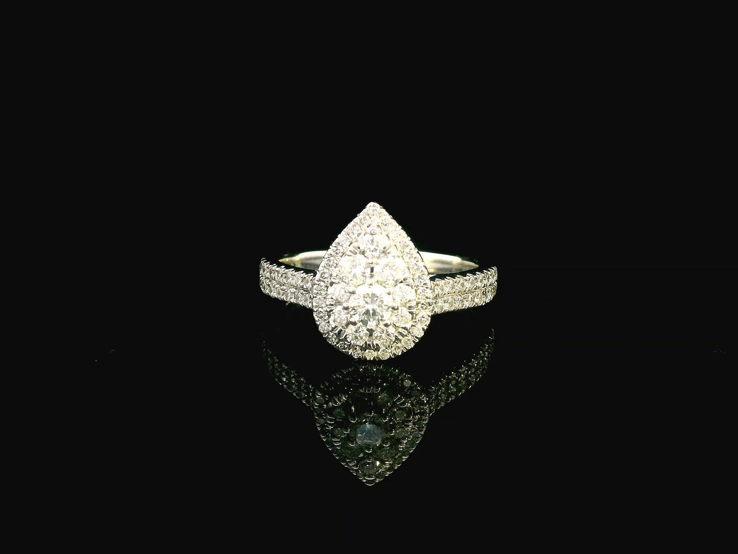 18K gold pear-shaped diamond cluster ring with double halo and split band – 0.75 carat total weight