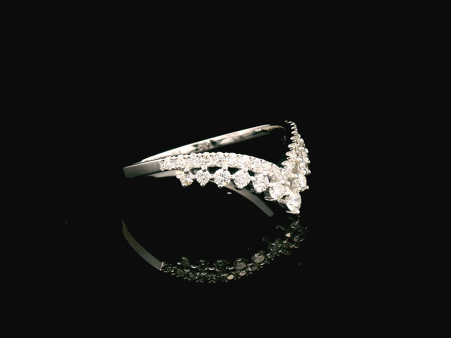 18K gold V-shape diamond ring with 0.47 carat round diamonds in a chevron silhouette
