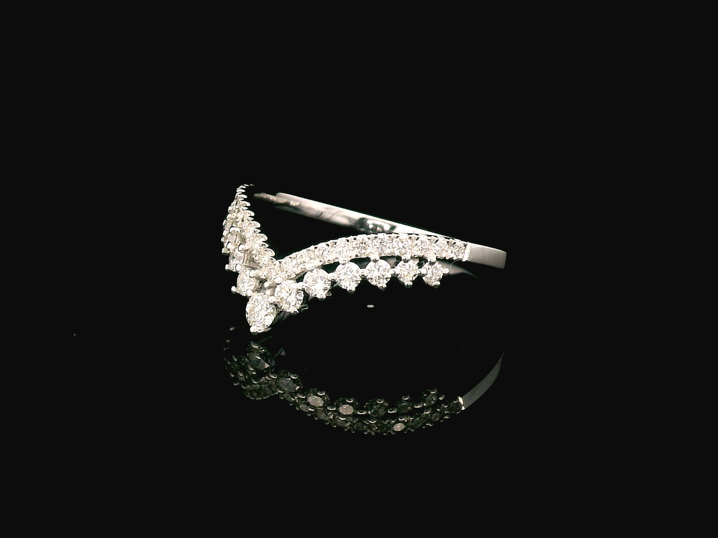 18K gold V-shape diamond ring with 0.47 carat round diamonds in a chevron silhouette