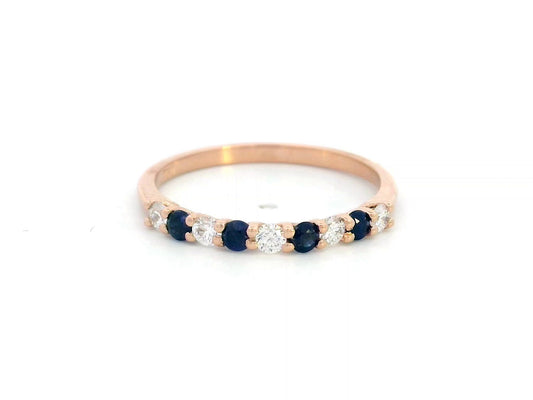 18K rose gold half eternity ring with alternating blue sapphires and diamonds