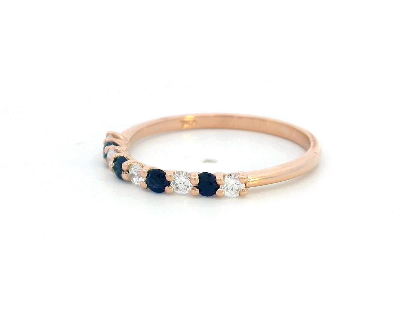 18K rose gold half eternity ring with alternating blue sapphires and diamonds