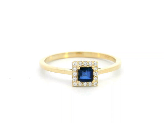 18K gold ring with square-cut 0.25 carat sapphire and diamond halo – minimal and elegant design
