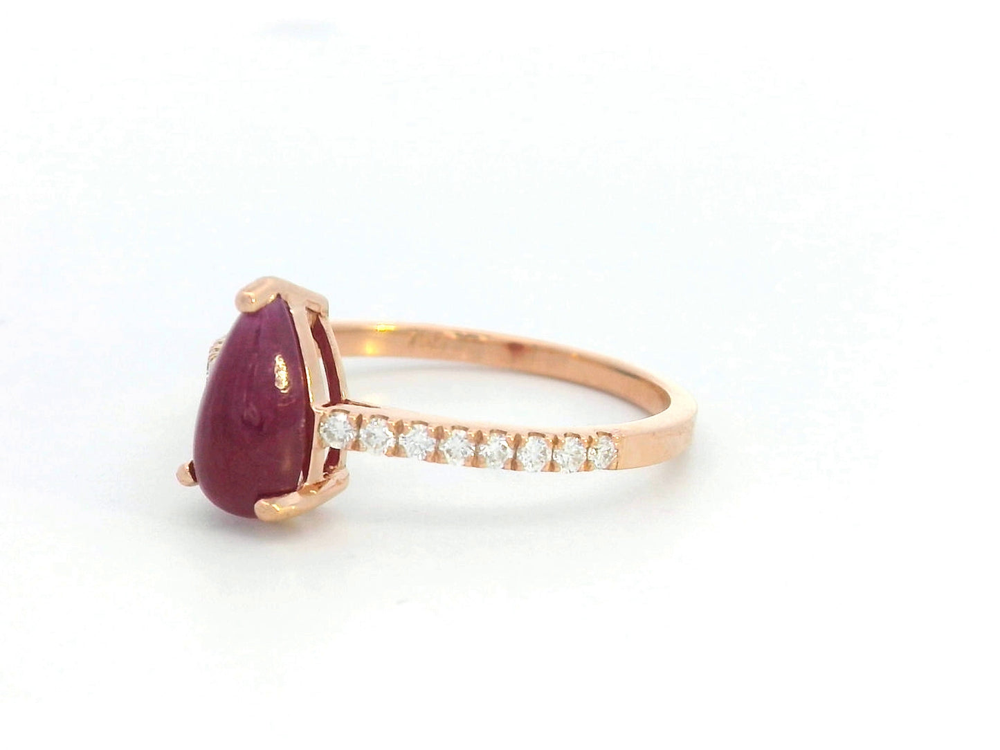 18K rose gold ring with pear-shaped cabochon ruby and diamond pavé band – 1.29 carat ruby