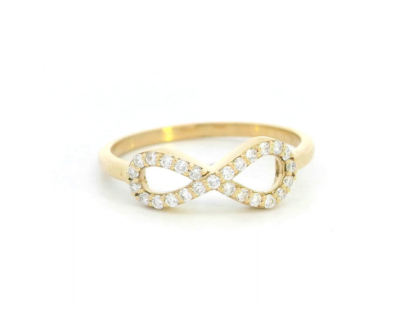 18K gold infinity ring with diamonds, symbolizing love, friendship & eternity.
