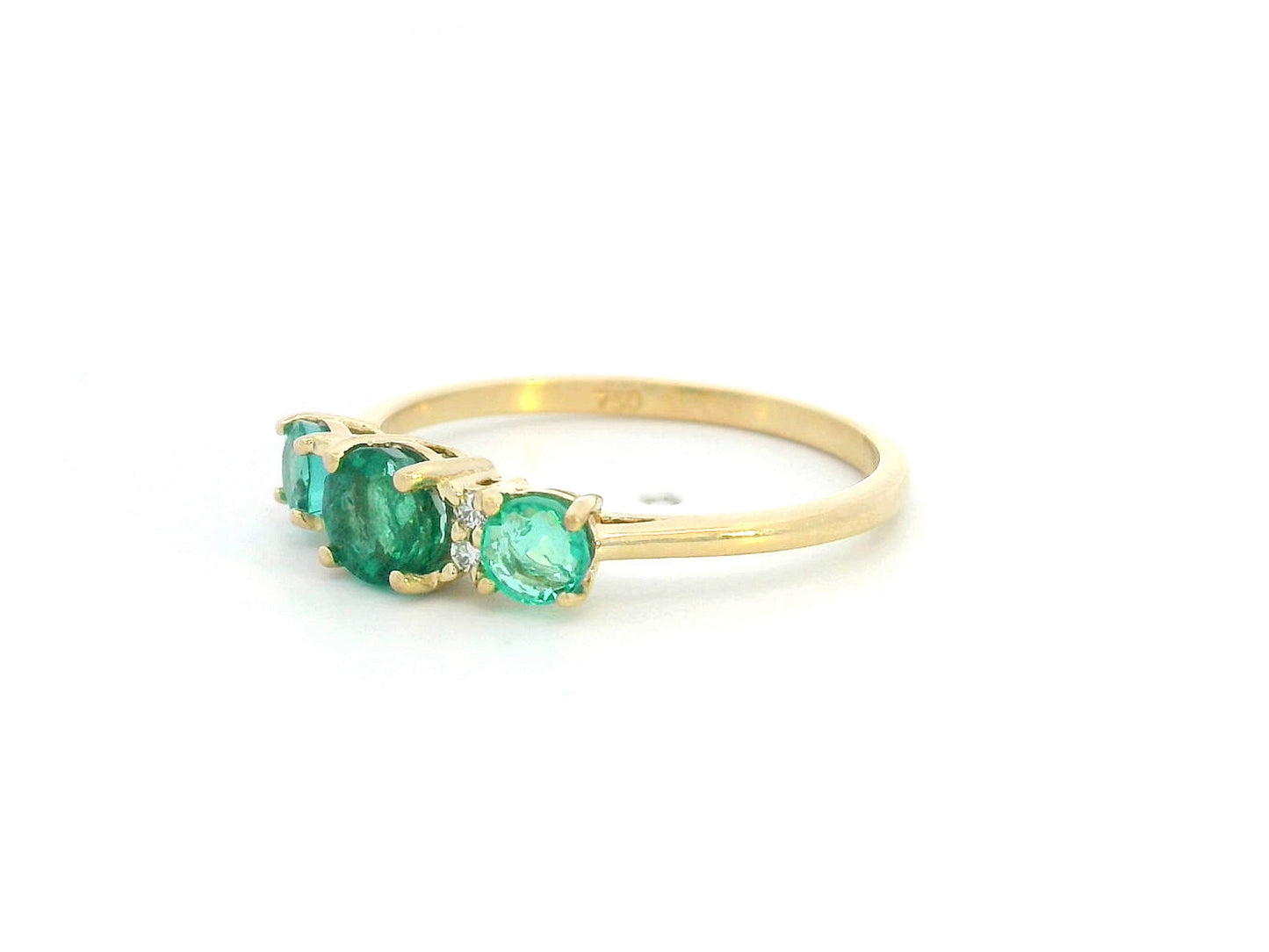18K yellow gold emerald trilogy ring with diamond accents – 0.81ct emerald, 0.03ct diamond