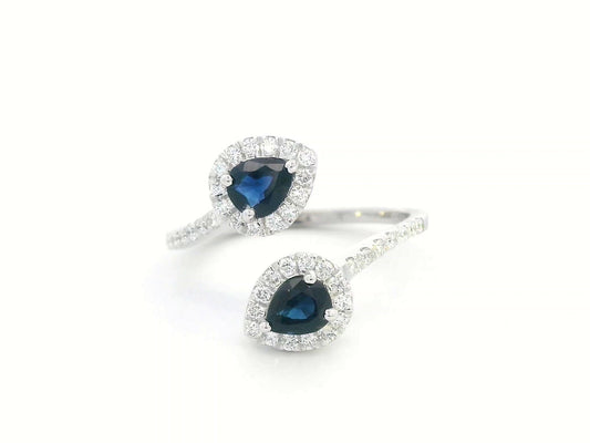 Pear-shaped sapphire and diamond bypass ring in 18K white gold with double halo design