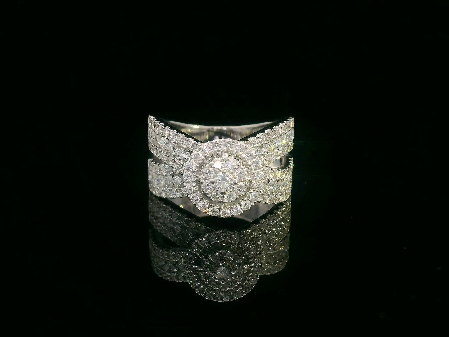 18K white gold diamond ring with round cluster center, halo, and split shank – 2.30 carats total.
