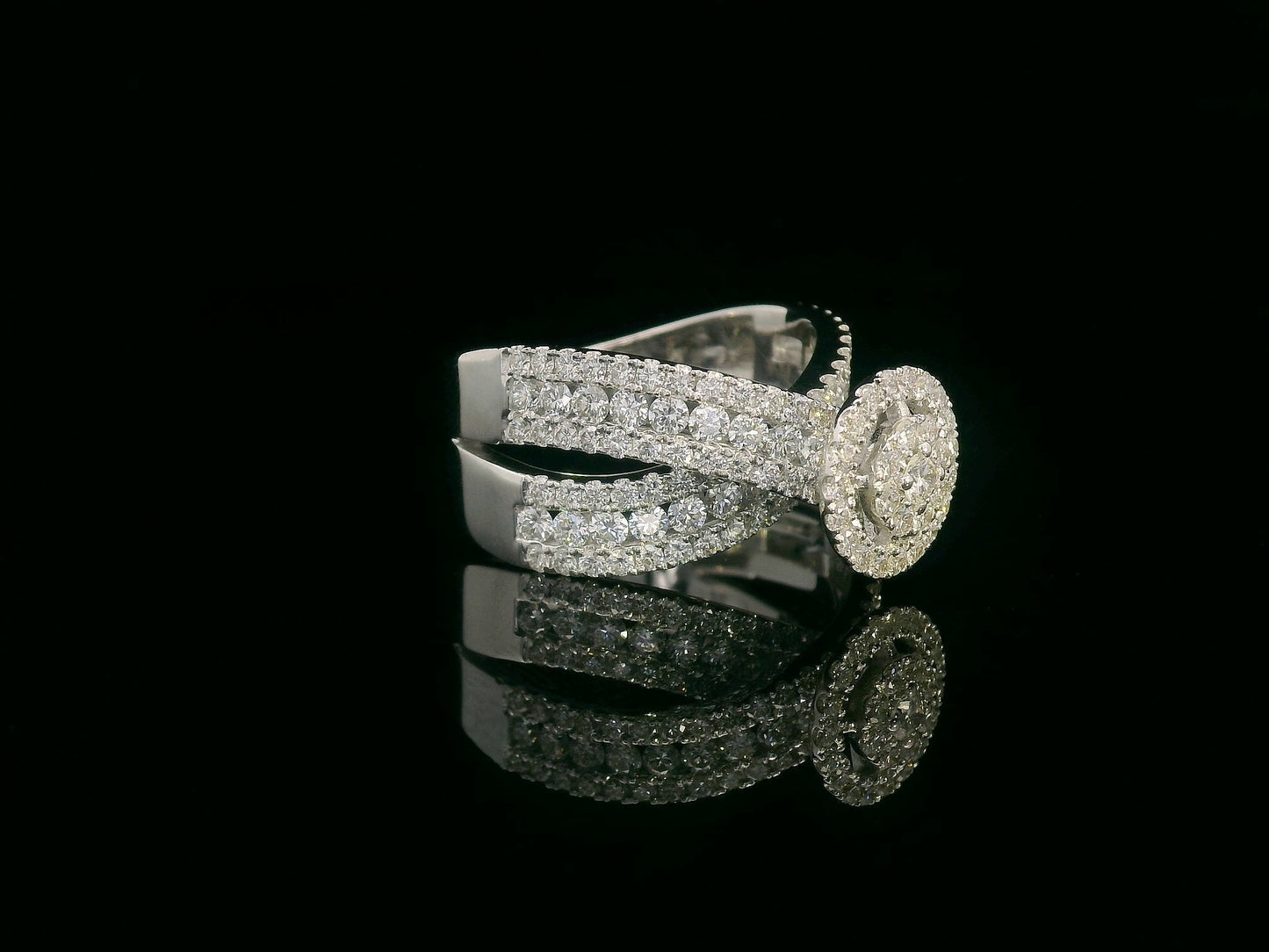 18K white gold diamond ring with round cluster center, halo, and split shank – 2.30 carats total.