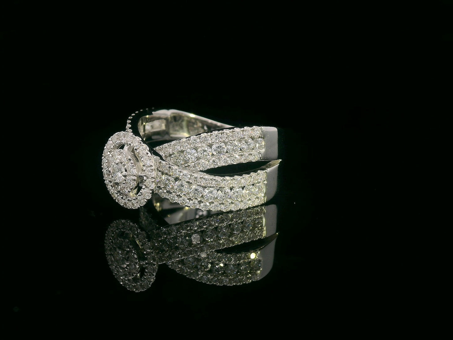 18K white gold diamond ring with round cluster center, halo, and split shank – 2.30 carats total.