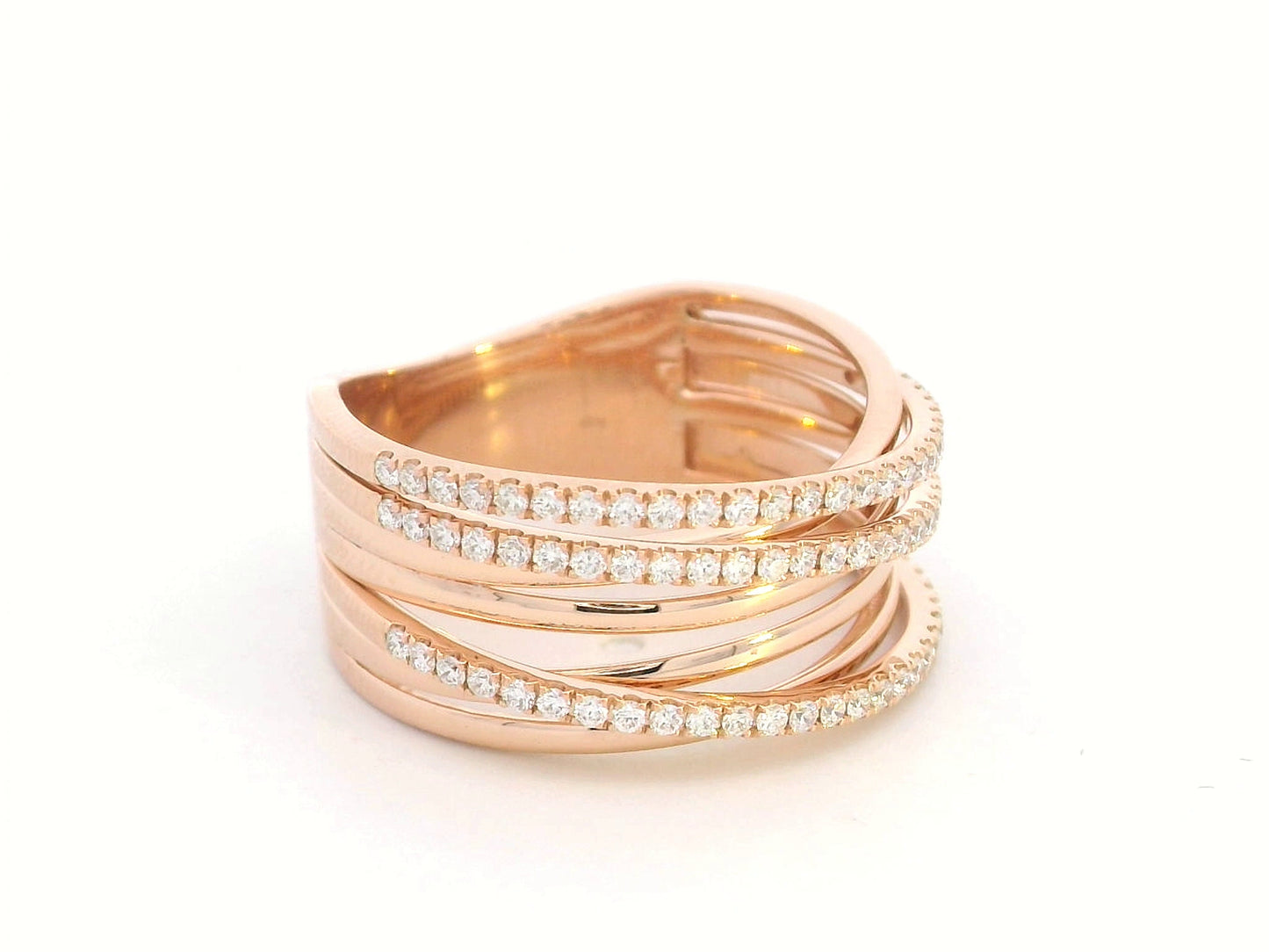 18K rose gold crossover ring with 0.46 carat round pavé diamonds, layered multi-band statement design.