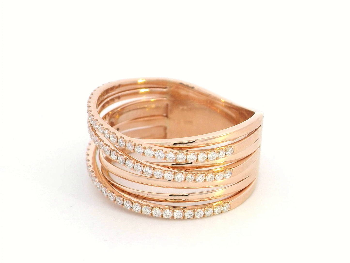 18K rose gold crossover ring with 0.46 carat round pavé diamonds, layered multi-band statement design.