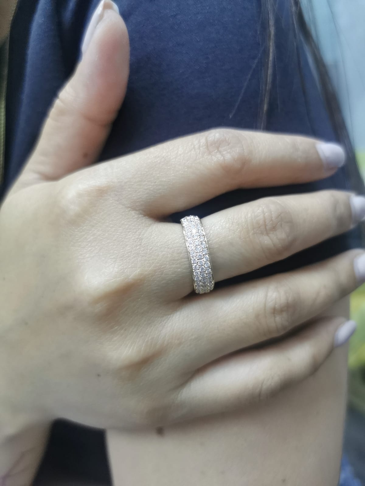 Three-row pavé diamond band ring in 18K yellow gold with 0.80 carats of round-cut diamonds