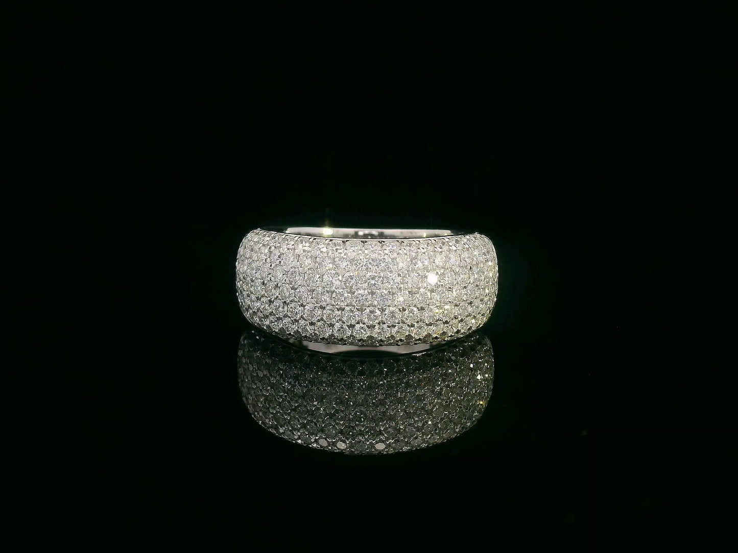 18K gold domed band ring with pavé diamonds covering the top half