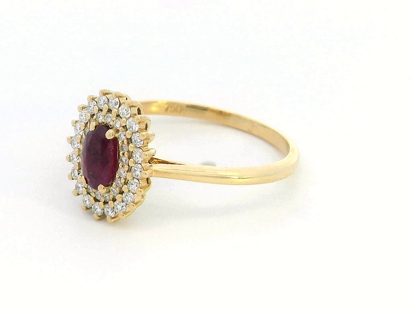 18K gold oval ruby and diamond halo ring with double halo design