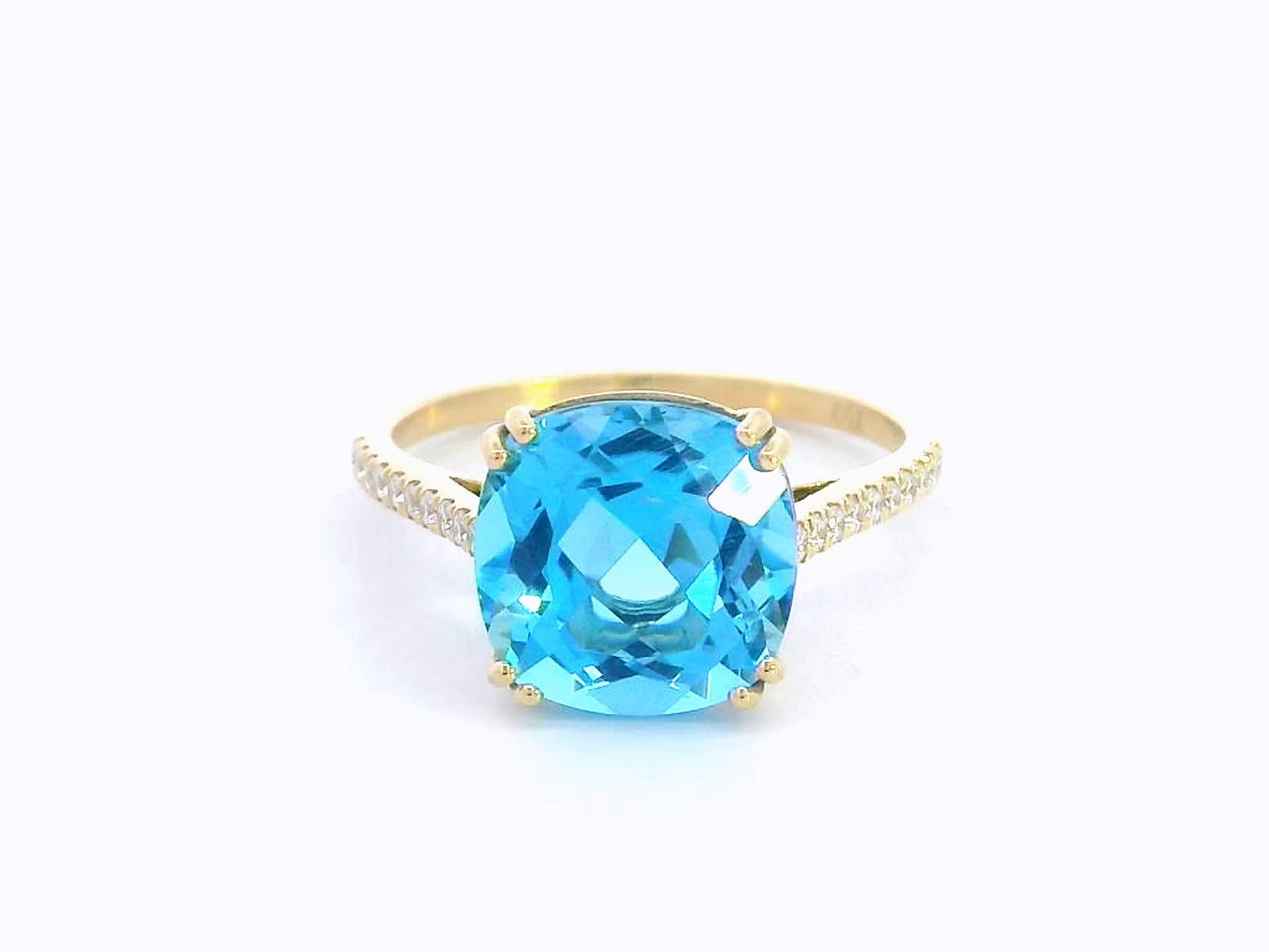 18K yellow gold ring with 5.33 carat cushion-cut Swiss Blue Topaz and diamond-accented band