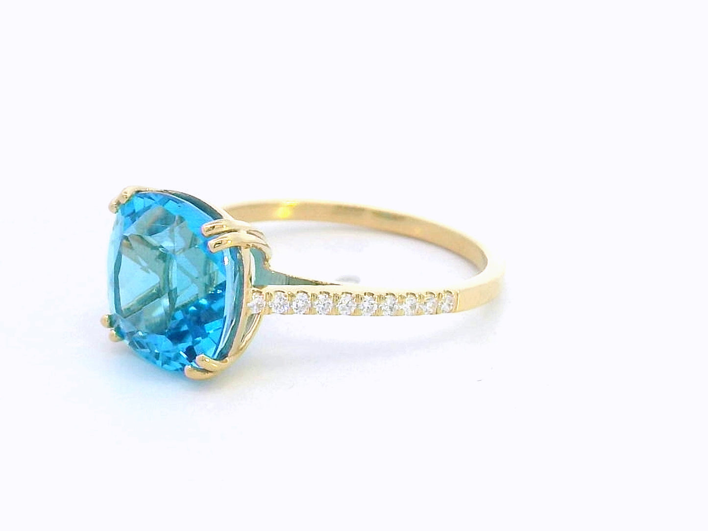 18K yellow gold ring with 5.33 carat cushion-cut Swiss Blue Topaz and diamond-accented band