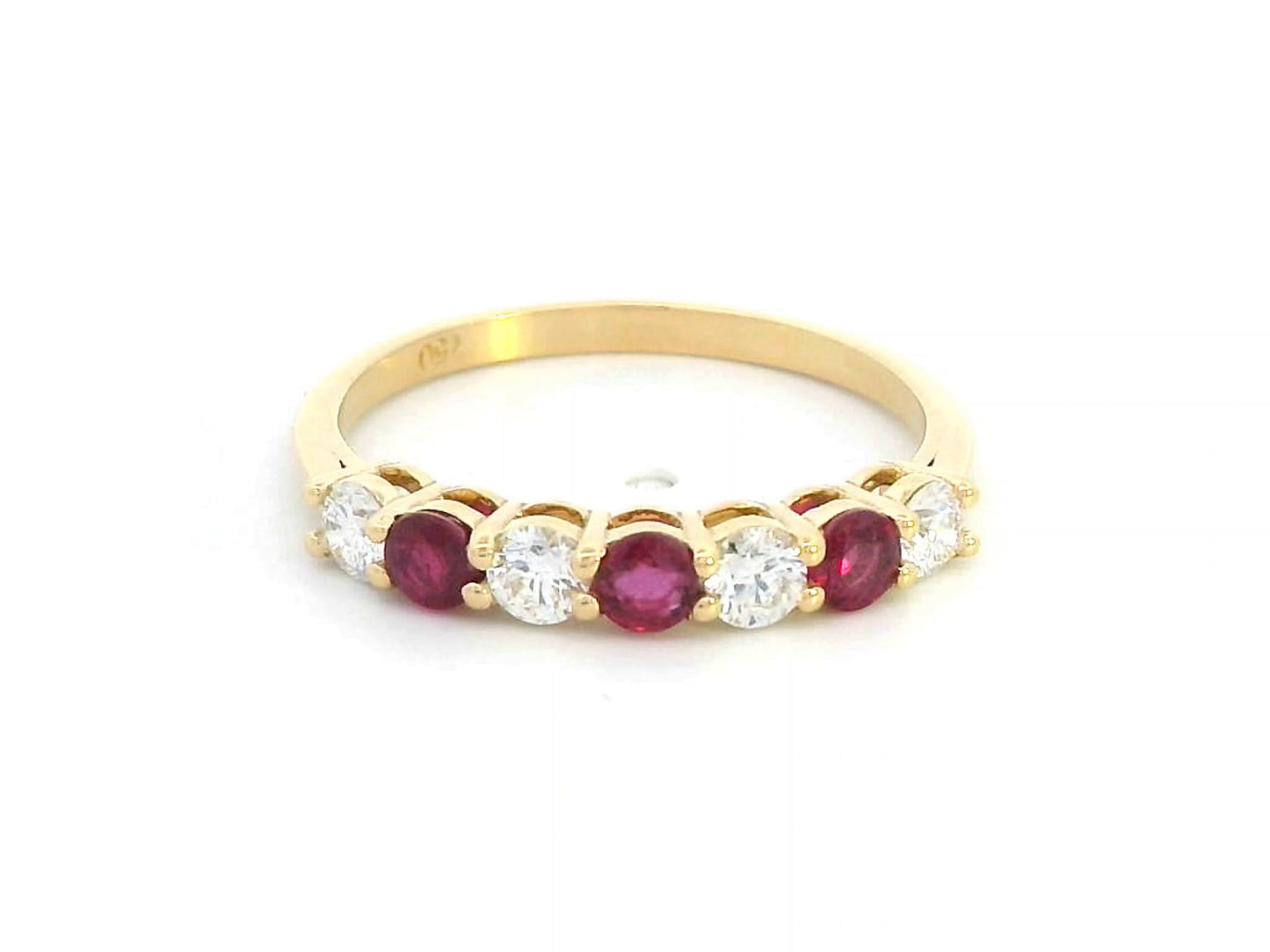 18K yellow gold ring with alternating rubies and diamonds, elegant half-eternity band design.
