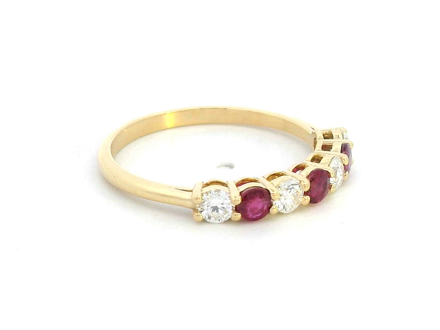 18K yellow gold ring with alternating rubies and diamonds, elegant half-eternity band design.