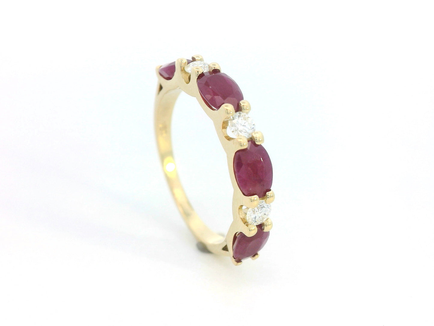 18K gold ring with alternating oval rubies and round diamonds – half eternity design, stackable birthstone ring