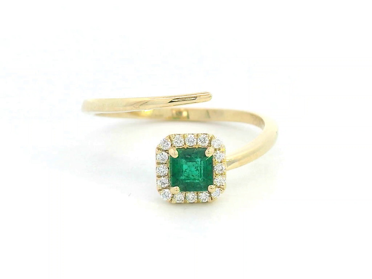 18K gold open-band ring with 0.38 carat emerald and diamond halo