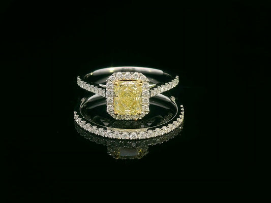 Bridal set with 1.08 carat radiant-cut fancy yellow diamond and 0.53 carat white diamonds in 18K gold