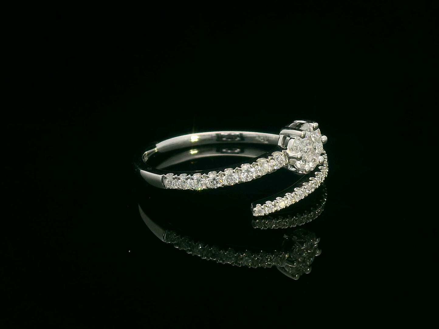 18K white gold bypass ring with cluster and single row diamond design – 0.39 carat.