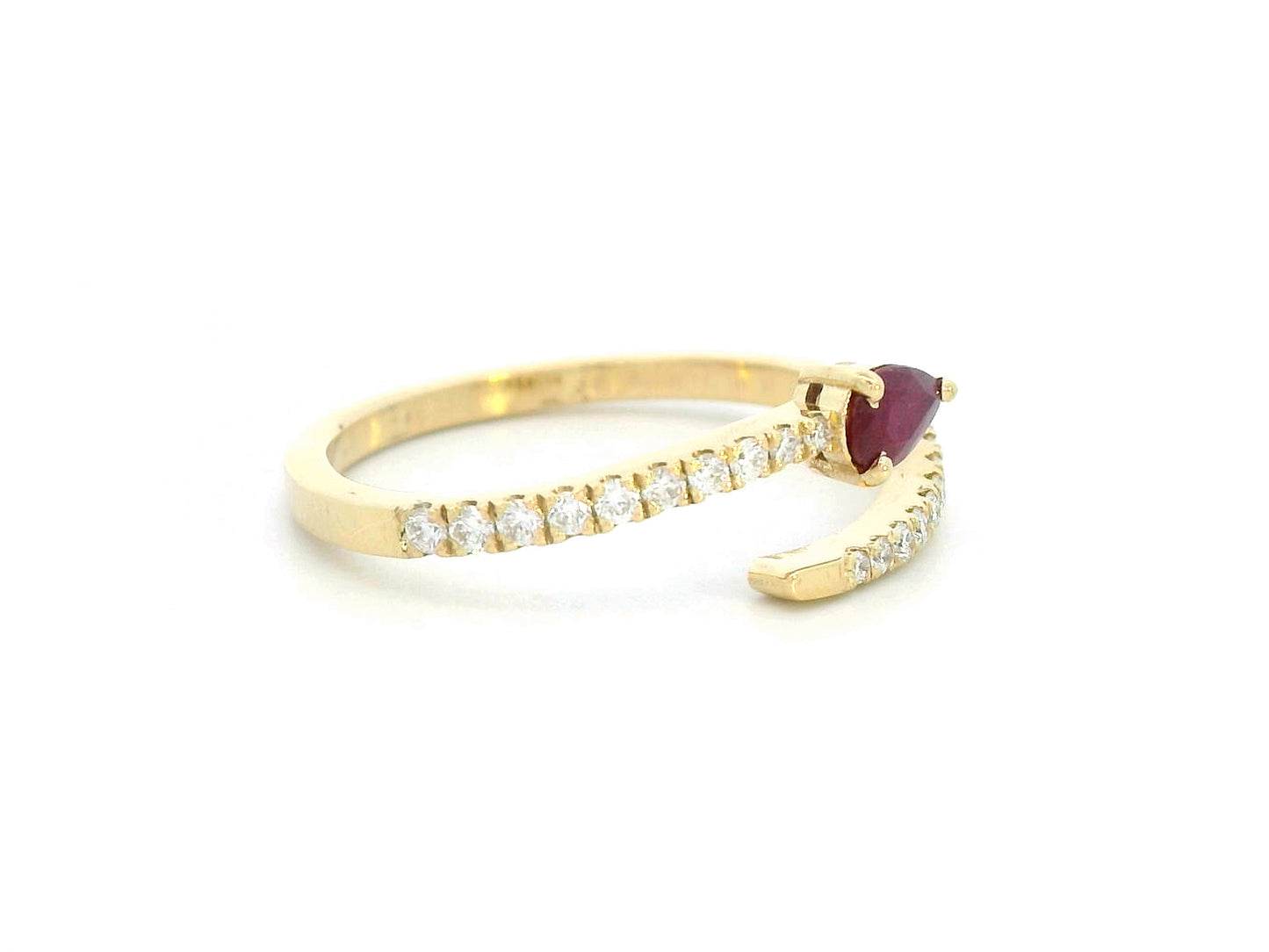 18K yellow gold bypass ring with pear-cut ruby and pavé-set diamonds in open design