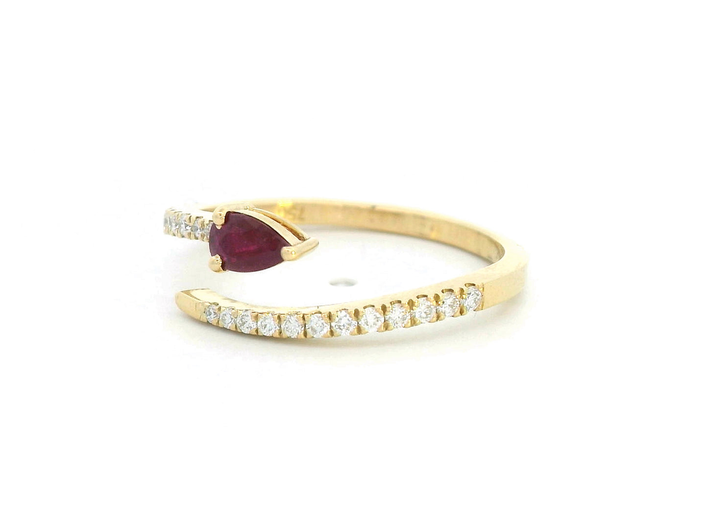 18K yellow gold bypass ring with pear-cut ruby and pavé-set diamonds in open design