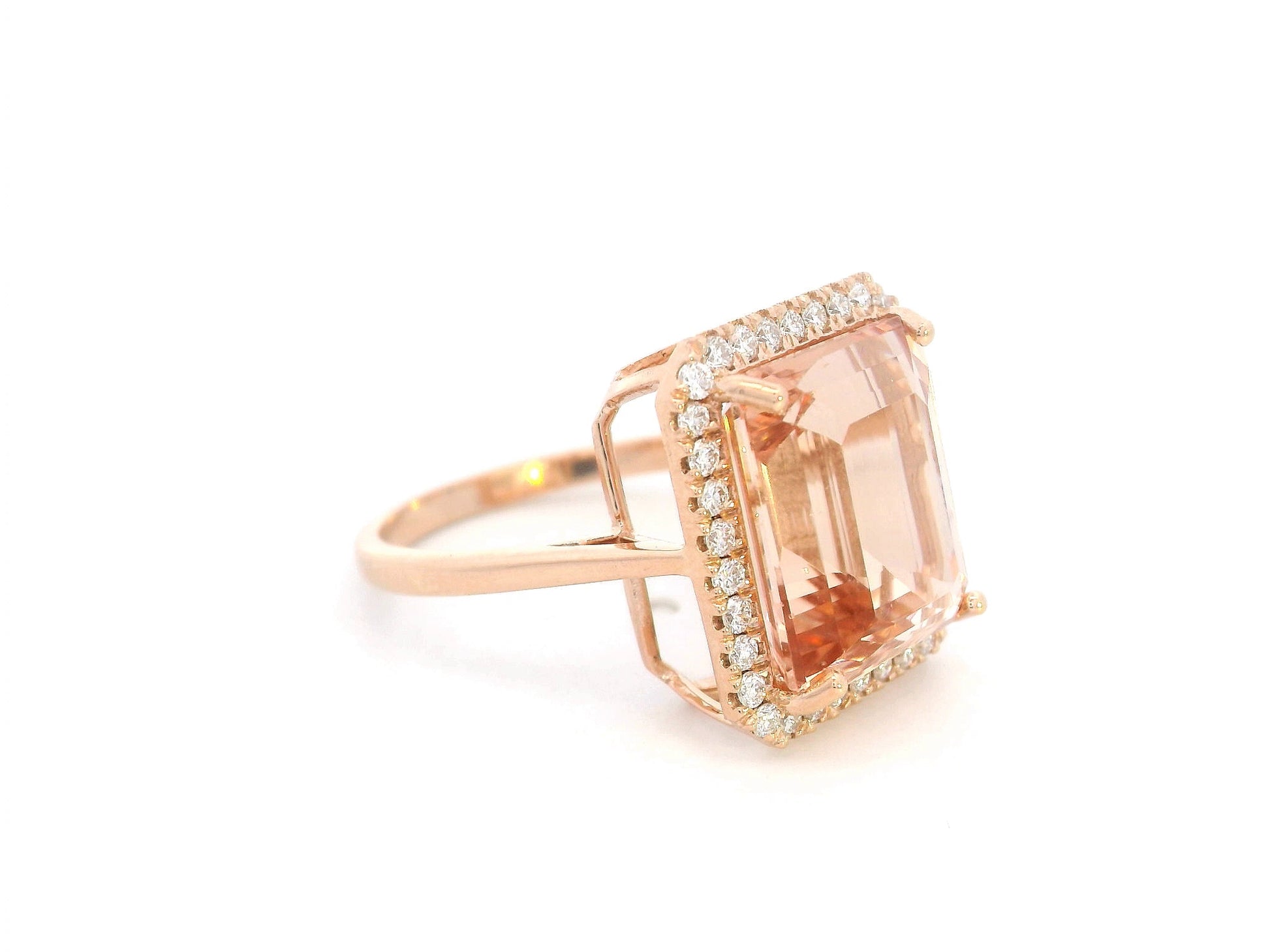 Emerald-cut morganite halo ring in 18K rose gold with 0.35ct diamonds