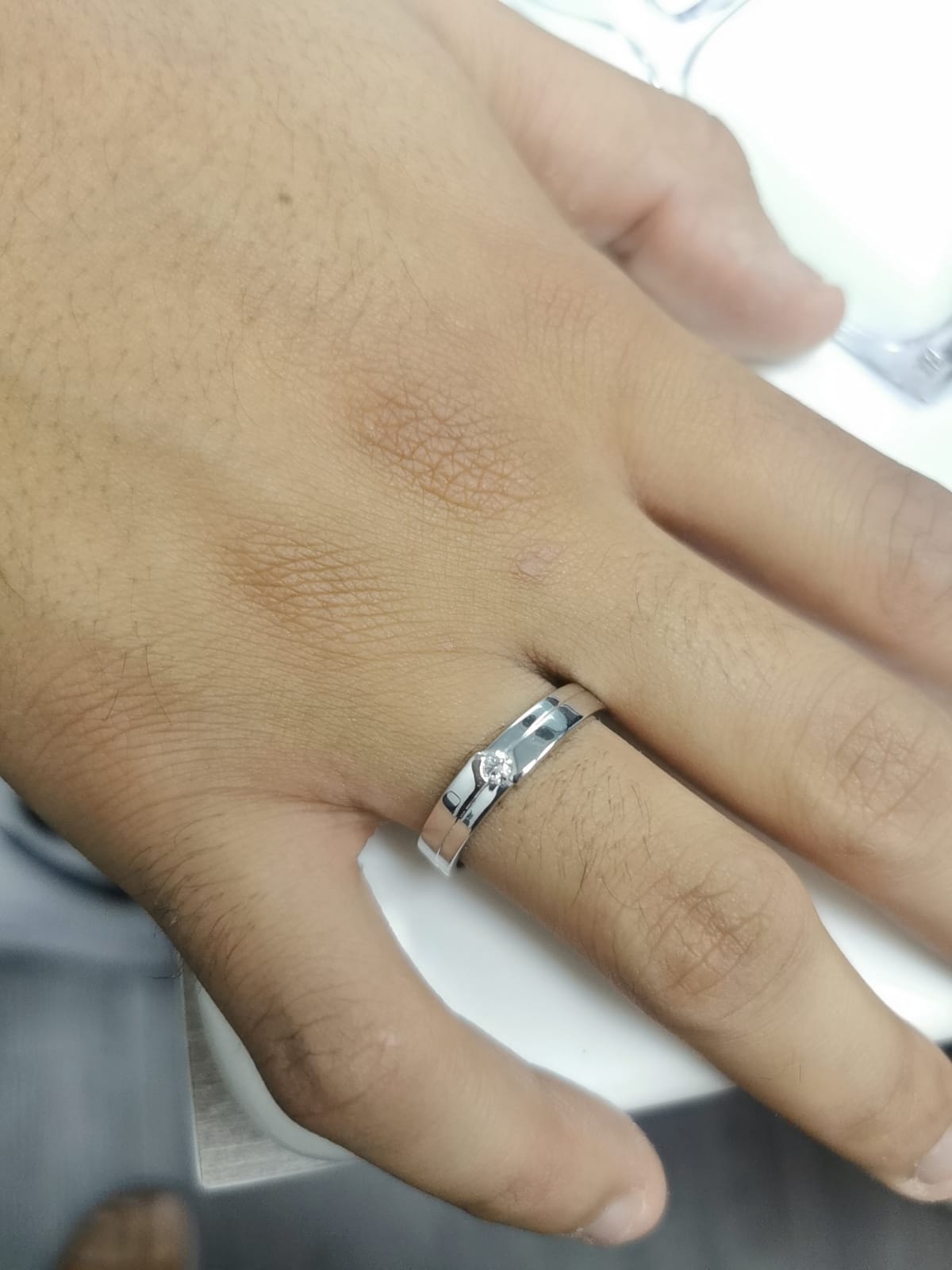 18K White Gold Minimalist Diamond Ring with Polished Band and Subtle Ridge