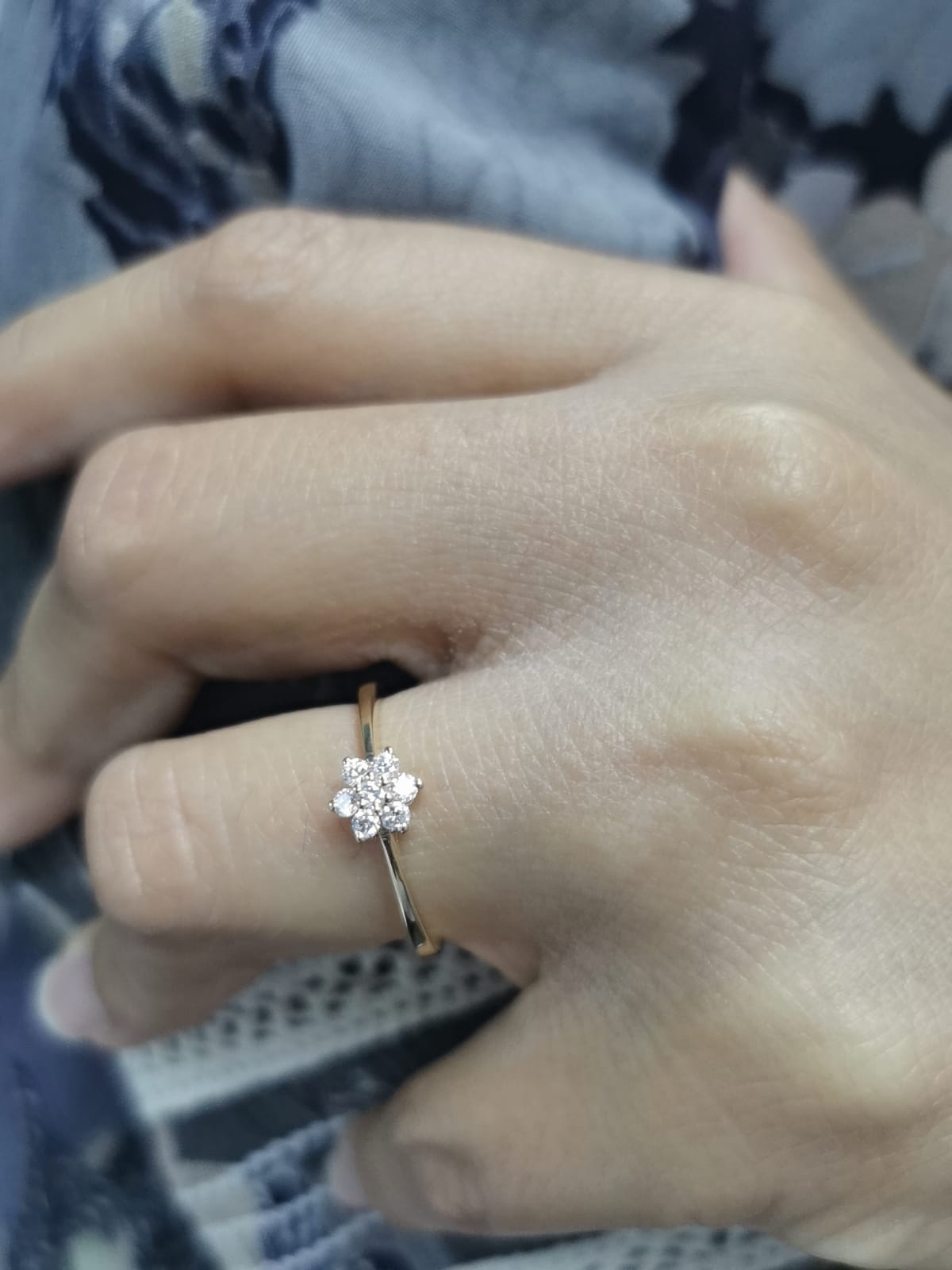 Floral diamond cluster ring in 18K yellow gold with 0.21 carat round brilliant diamonds