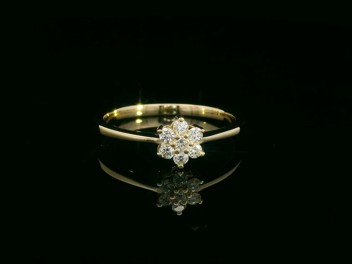 Floral diamond cluster ring in 18K yellow gold with 0.21 carat round brilliant diamonds