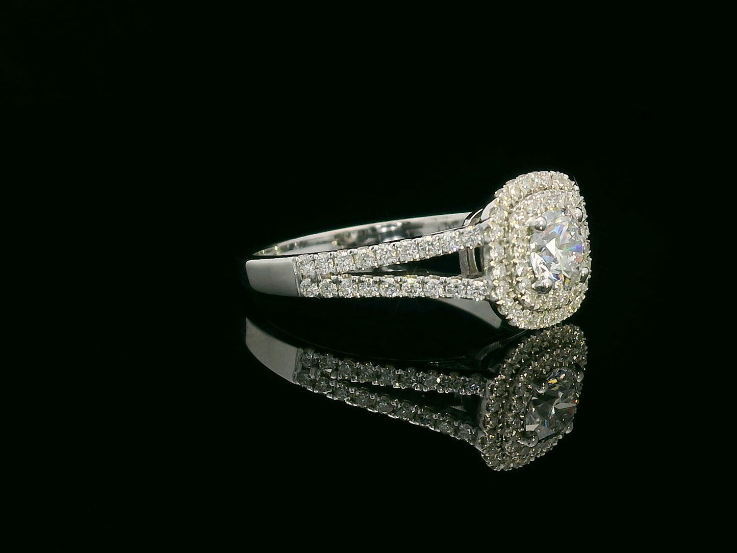 GIA certified 18K gold engagement ring with 0.50ct center diamond and double halo