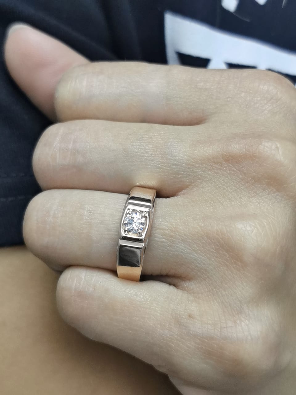 Men’s 18K gold solitaire ring with 0.32 carat diamond in four-prong setting, wide band design