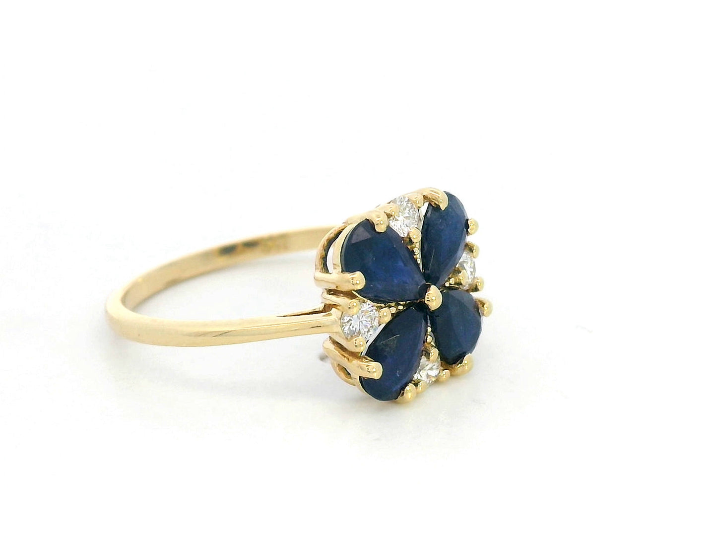 18K yellow gold floral ring with pear-cut blue sapphires and diamond accents
