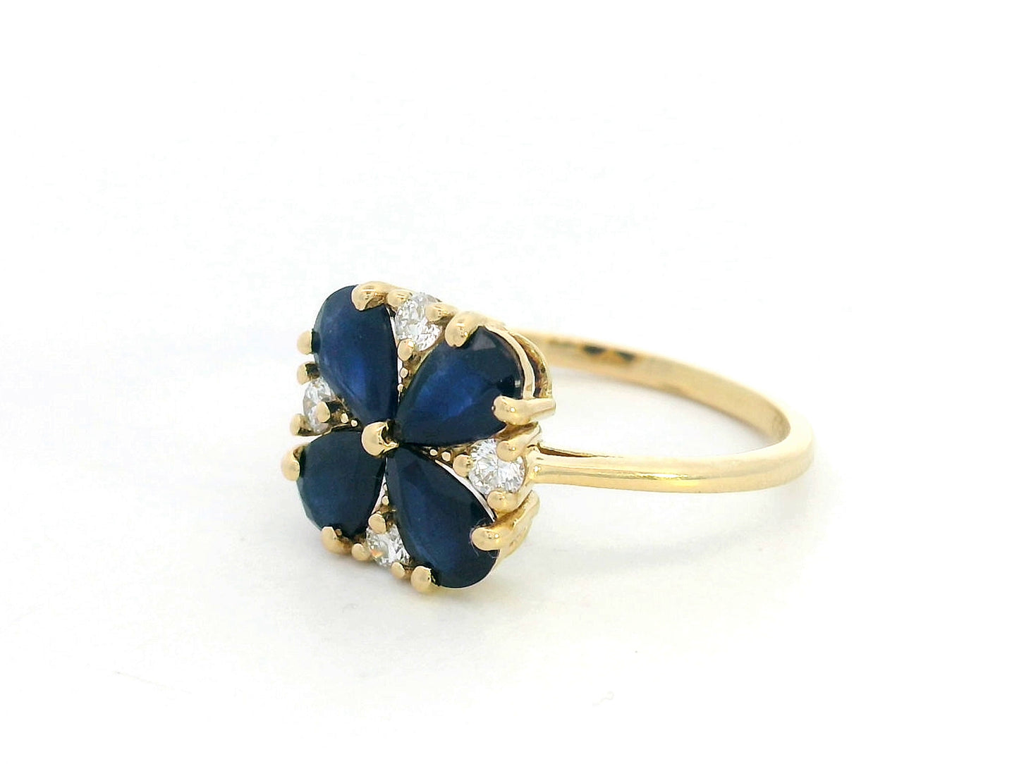 18K yellow gold floral ring with pear-cut blue sapphires and diamond accents