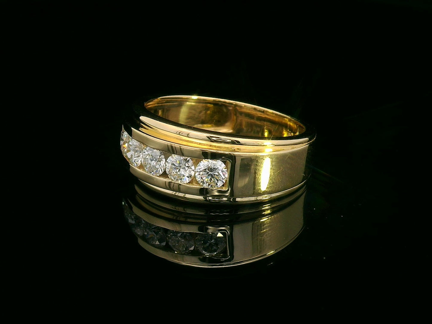 Men’s 18K yellow gold ring with five channel-set round diamonds, 0.97 carat total.