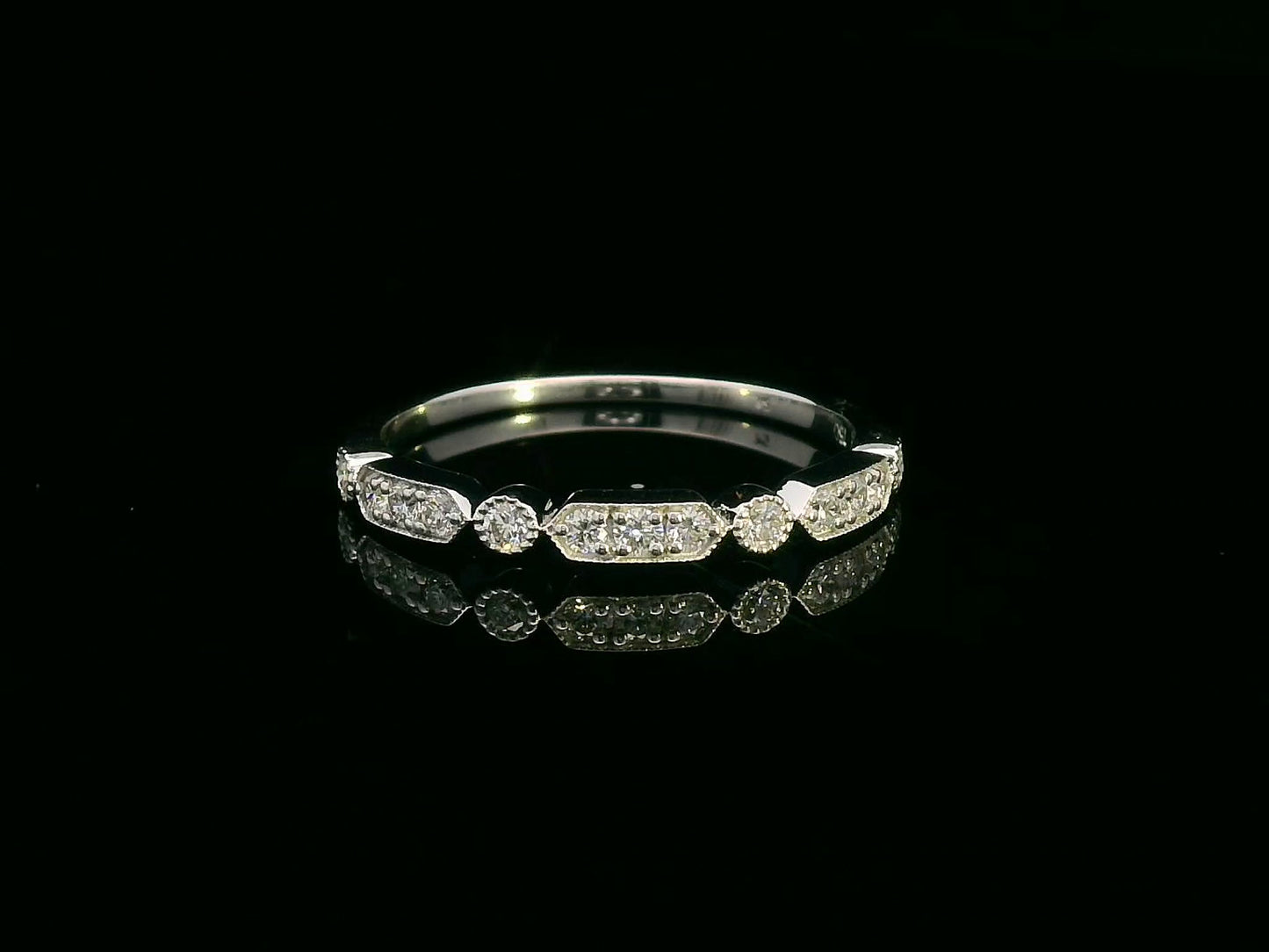 18K white gold band with alternating marquise and round shapes pavé-set with diamonds